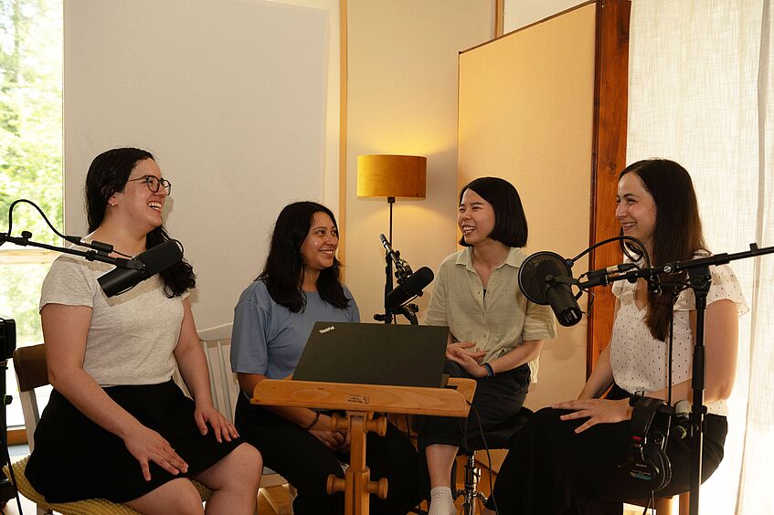 Four women with microphones during the recording